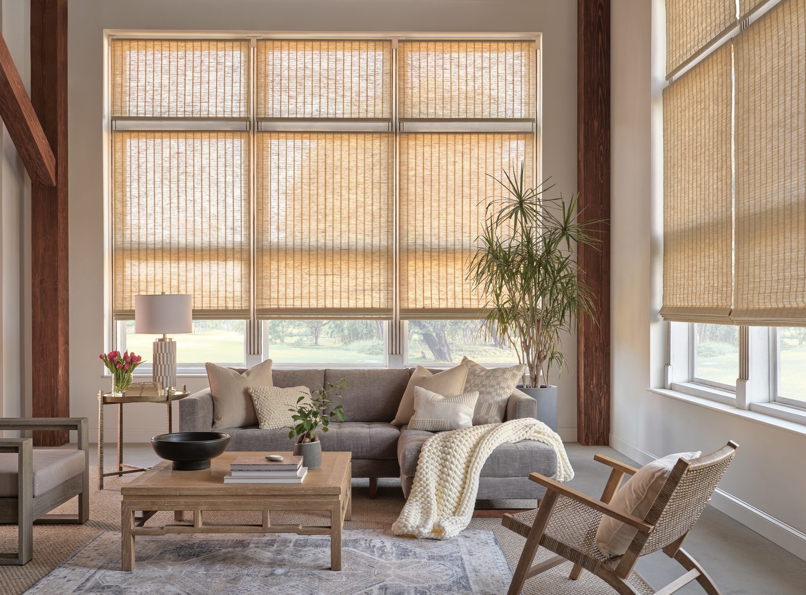 Hunter Douglas Provenance&reg; Woven Wood Shades with PowerView&reg; motorization in a living room